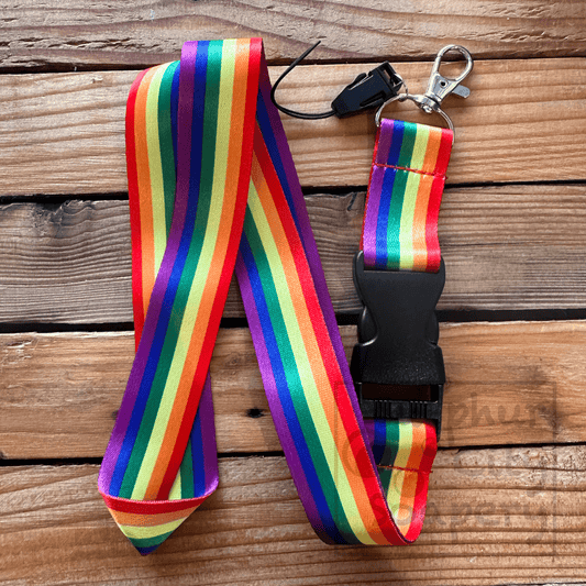 Sulphur City Soapery pronoun pin Pride lanyard.