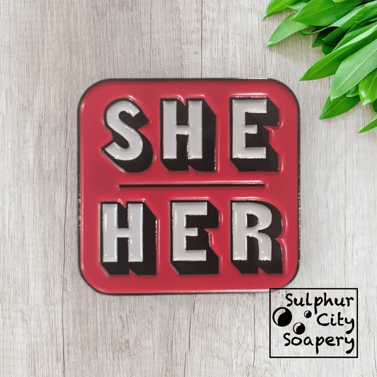 Sulphur City Soapery pronoun pin Pronoun pin in black and pink -  She / Her