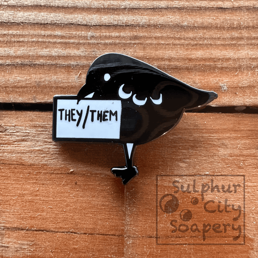 Sulphur City Soapery pronoun pin They/Them black bird - Pride Pin.